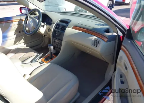 2002 Toyota Camry Solara Sle V6 z USA, uszkodzony, nr VIN 2T1CF22PX2C600437